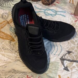 Skechers women’s  Black Knit Slip-On Athletic Sneakers